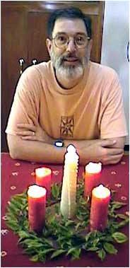 Duane with the Advent wreath. - jpg - 13737 Bytes