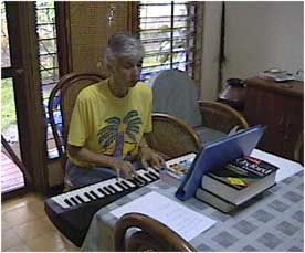 Clare Ann also plays piano for the International Congregation - jpg - 12527 Bytes